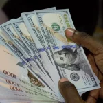 Naira holds steady as dollar trades at ₦1,379 officially