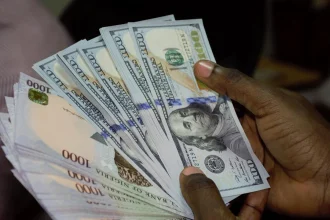 Naira holds steady as dollar trades at ₦1,379 officially