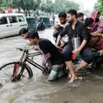 Bangladesh floods leaving streets and homes submerged after heavy rainfall