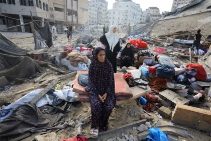 Palestinians in Gaza following reports that Hamas accepted a framework to store its heavy weapons