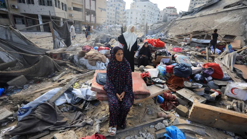 Palestinians in Gaza following reports that Hamas accepted a framework to store its heavy weapons