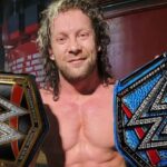 Kenny Omega celebrating AEW World Championship win over MJF