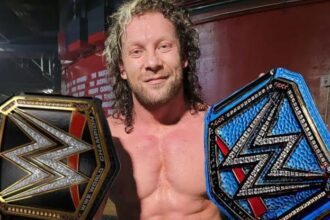 Kenny Omega celebrating AEW World Championship win over MJF