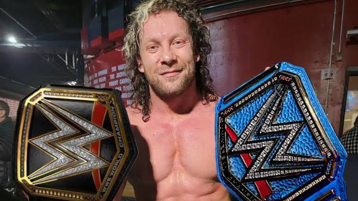 Kenny Omega celebrating AEW World Championship win over MJF