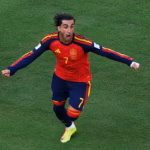 Spain players celebrating their 2026 FIFA World Cup final victory over Argentina