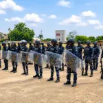 Kano police officers displaying combat skills during their passing-out ceremony in Hotoro