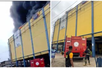 Smoke rising from the Justrite Superstore fire in the Akowonjo area of Lagos