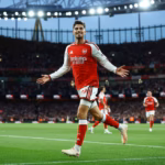 Arsenal players celebrate during their 3-0 Premier League victory over Coventry City