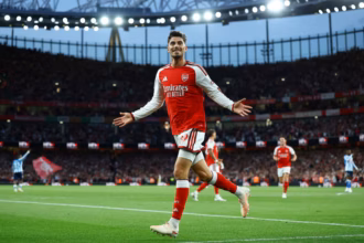 Arsenal players celebrate during their 3-0 Premier League victory over Coventry City