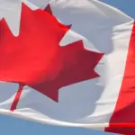 Canadian flag representing the latest Express Entry permanent residence invitation round