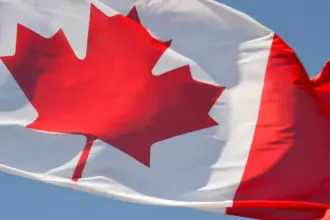 Canadian flag representing the latest Express Entry permanent residence invitation round