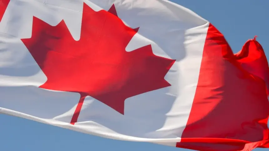 Canadian flag representing the latest Express Entry permanent residence invitation round