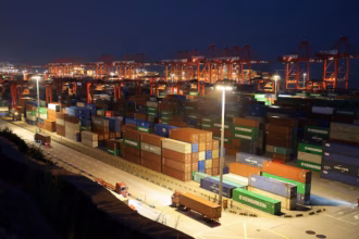 Shipping containers at a Chinese port as exports rise on stronger global demand for AI-related technology