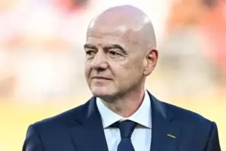 FIFA President Gianni Infantino announcing the withdrawal of the controversial World Cup investment plan