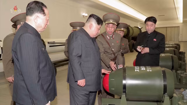North Korean leader Kim Jong Un inspecting nuclear weapons as South Korea estimates Pyongyang’s stockpile