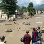 Devastation caused by flash floods in Nepal as rescue teams search for hundreds of missing people