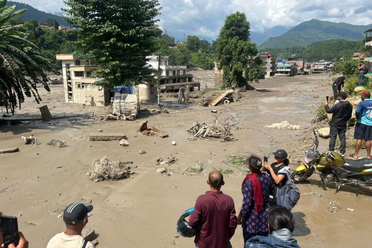 Devastation caused by flash floods in Nepal as rescue teams search for hundreds of missing people
