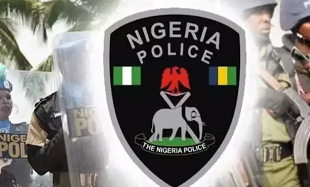 Enugu police displaying vehicle batteries and other items allegedly recovered from a theft suspect