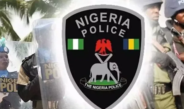 Enugu police displaying vehicle batteries and other items allegedly recovered from a theft suspect