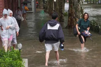 Heavy rain and flooding in eastern China after Typhoon Dolphin forced more than one million people from their homes