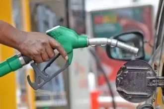Fuel nozzle at a filling station following Dangote Refinery’s petrol and diesel price reduction
