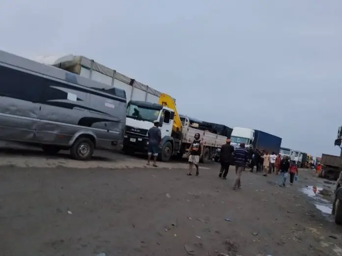 Vehicles trapped in massive gridlock along the damaged Benin-Agbor Road in Edo State