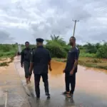Flooded road in Anambra as police issue safety alert to parents