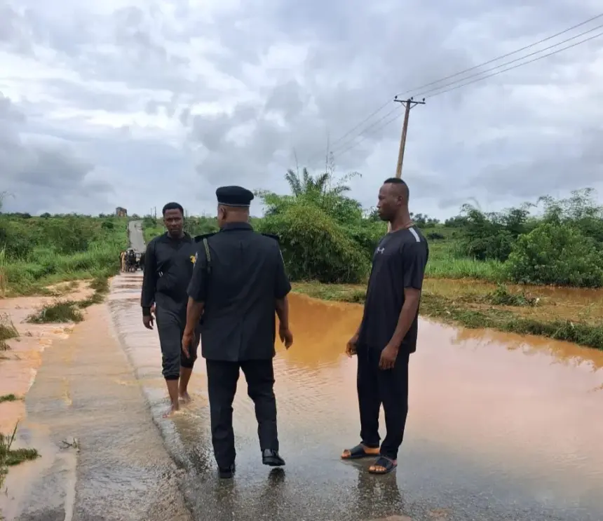 Flooded road in Anambra as police issue safety alert to parents