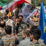 Iranian military personnel as Tehran warns against renewed US strikes