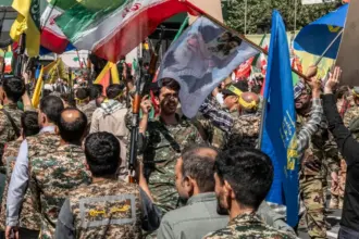 Iranian military personnel as Tehran warns against renewed US strikes