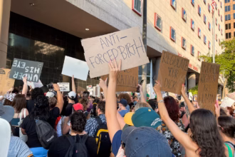 Protesters outside a Texas courthouse amid debate over abortion restrictions
