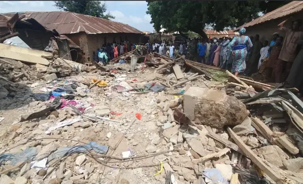 Emergency responders at the scene of a collapsed three-storey building in Ilorin, Kwara State