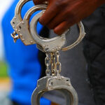 Police handcuffs following the arrest of six robbery suspects in Akwa Ibom