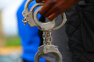 Police handcuffs following the arrest of six robbery suspects in Akwa Ibom