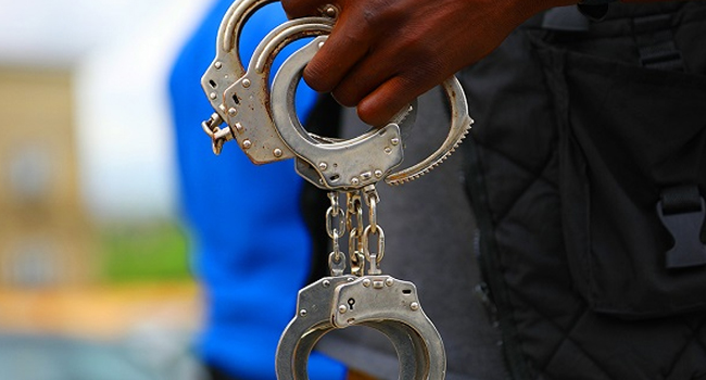 Police handcuffs following the arrest of six robbery suspects in Akwa Ibom