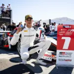 Nigerian-American racing driver Ugo Ugochukwu celebrating his 2026 FIA Formula 3 championship