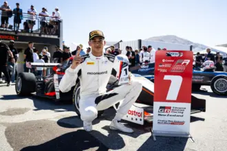 Nigerian-American racing driver Ugo Ugochukwu celebrating his 2026 FIA Formula 3 championship