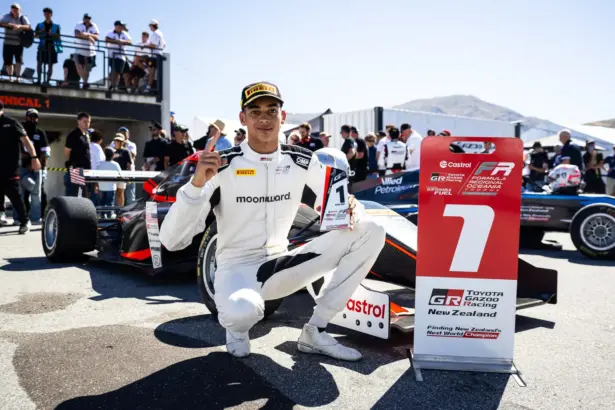 Nigerian-American racing driver Ugo Ugochukwu celebrating his 2026 FIA Formula 3 championship