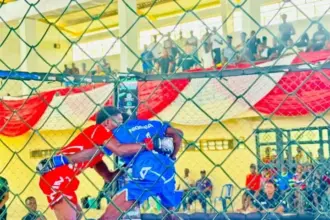 Bayelsa athletes and officials celebrating victory at the Sunday Dare National MMA Championship