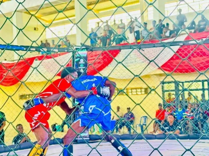 Bayelsa athletes and officials celebrating victory at the Sunday Dare National MMA Championship