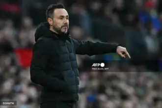 Tottenham manager Roberto De Zerbi reacting during a Premier League match