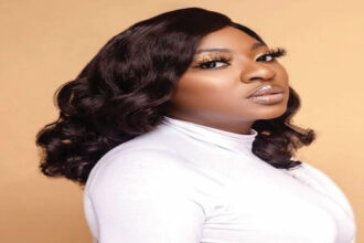 Nollywood actress Yvonne Jegede speaking to secondary school students