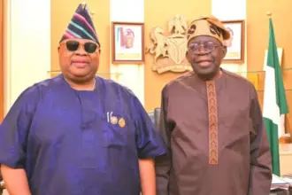 Osun Governor Ademola Adeleke dancing with President Bola Tinubu at the APC campaign council inauguration in Abuja